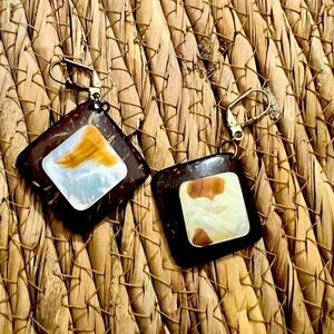 Coconut shell in diamond shape accented with mother of pearl